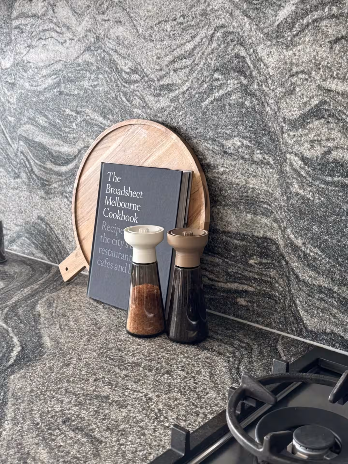 Kitchen detail with cookbook and spices